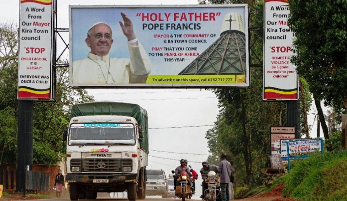 Uganda passes controversial NGO bill on eve of pope`s arrival